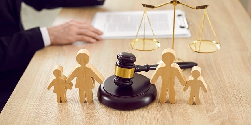 Figures,Of,Family,Are,Separated,By,Judge's,Gavel,,Which,Symbolizes