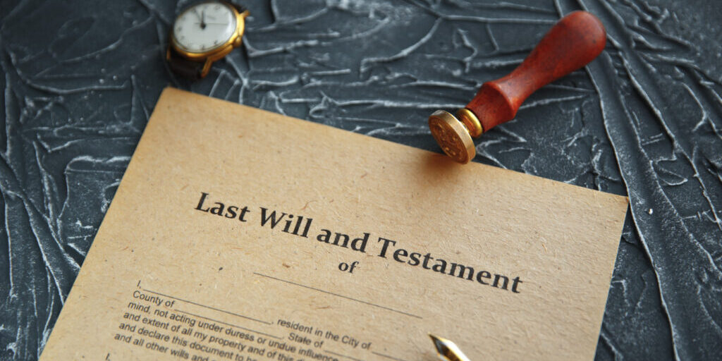 Notary's public pen and stamp on testament and last will. Notary public tools