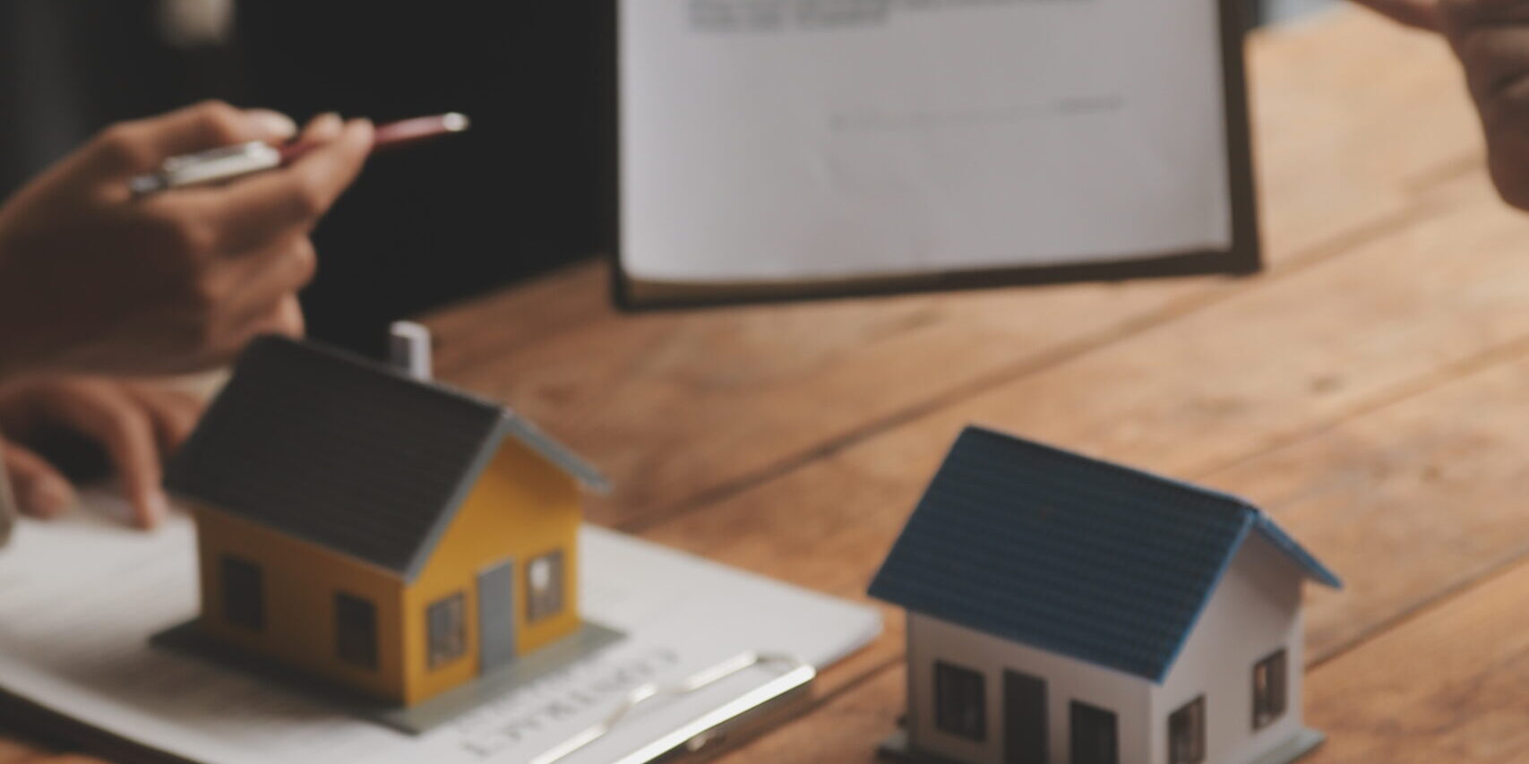 Real estate agent and Sales manager team analysis pricing of rental lease contract of sale purchase agreement, concerning mortgage loan offer for and house insurance.